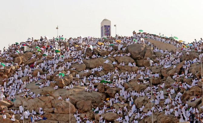 Pilgrims ascend Mount Arafat for hajj rites